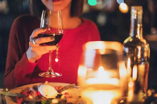 woman dinner wine glass